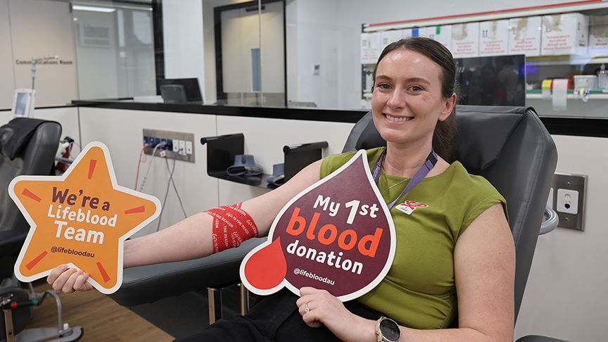 Staff member giving blood