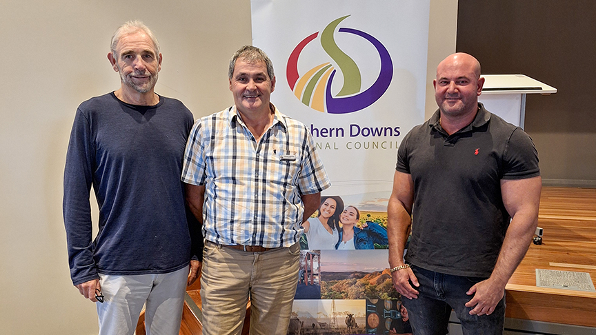 Wayne Wigham, Russell Wantling and Richard Henshaw standing in front of a Southern Downs Regional Council popup banner