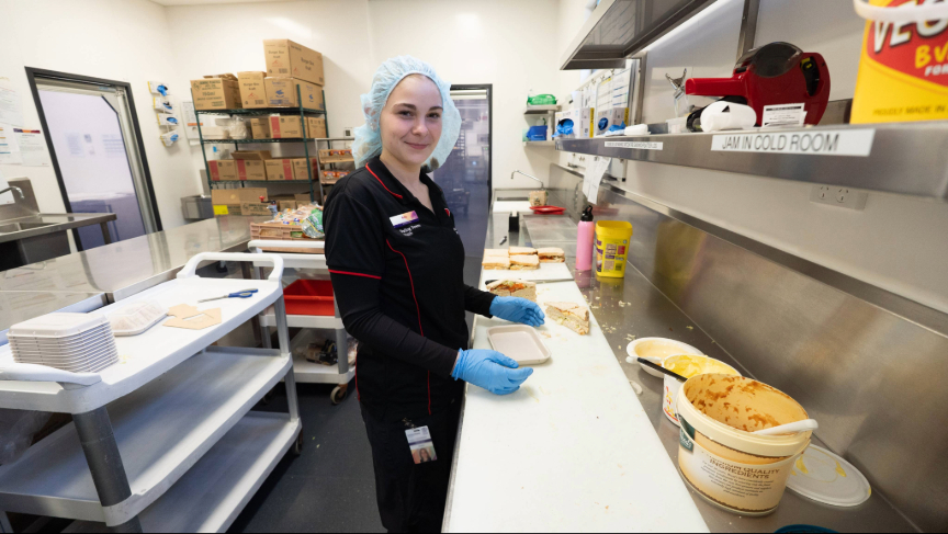 A student preparing a meal at Toowoomba Hospital.